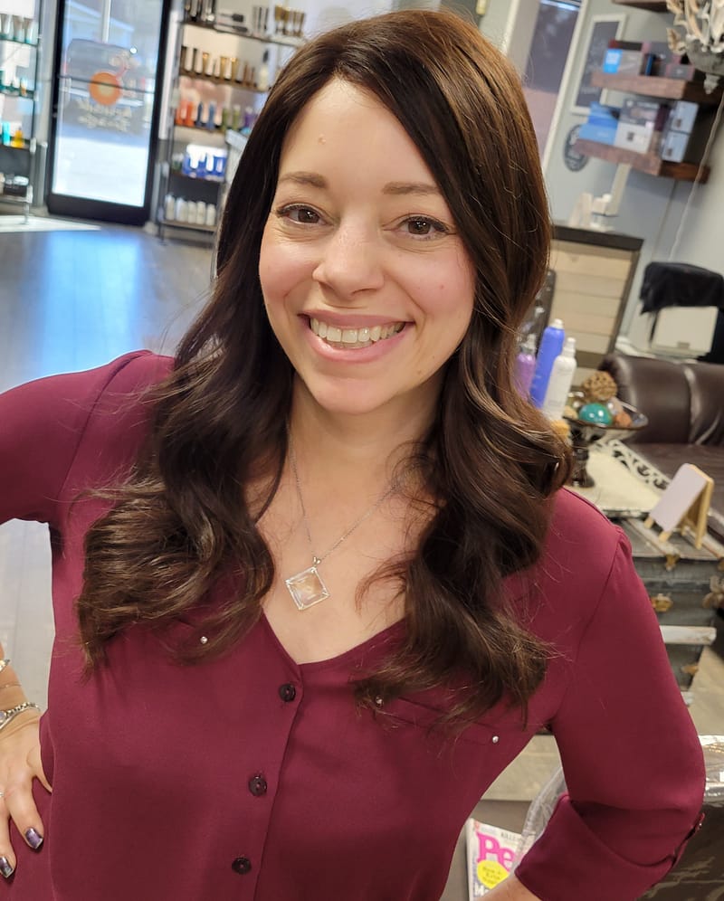 woman wearing long wig made from her own hair